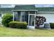 Enclosed porch for entertaining, with greenery for privacy, and A/C at 4203 34Th Avenue W Dr # 17, Bradenton, FL 34205