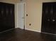 Bedroom featuring two large closets and wood-look flooring at 4460 Ironwood Cir # 505Ad, Bradenton, FL 34209