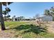 Expansive lawn and mature trees create a serene outdoor space with plenty of room to roam at 45 Cape Haze Dr, Placida, FL 33946