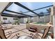 Indoor pool area featuring a jacuzzi and a covered ceiling at 45 Cape Haze Dr, Placida, FL 33946