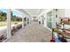 Expansive patio with a full outdoor kitchen offering ample space for entertaining and relaxation at 45 Cape Haze Dr, Placida, FL 33946