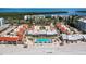 Beachfront condos and pool, complete with private beach access and lush greenery, perfect for relaxation at 4621 Gulf Of Mexico Dr # 19B, Longboat Key, FL 34228