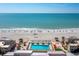 Coastal condo complex with a pool and beach access at 4621 Gulf Of Mexico Dr # 19B, Longboat Key, FL 34228