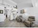 Bright and comfortable living room boasts high ceilings and seamlessly connects to the kitchen at 4621 Gulf Of Mexico Dr # 19B, Longboat Key, FL 34228