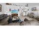 Cozy living room featuring comfortable sofas, tile floors, and a view to the kitchen area at 4621 Gulf Of Mexico Dr # 19B, Longboat Key, FL 34228