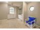 Large bathroom with tile floor, window, dual sinks and a shower chair at 5007 Palermo Dr, Punta Gorda, FL 33950