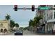 View of Marion Avenue showcasing its palm-lined streets, storefronts, and pedestrian-friendly atmosphere at 5007 Palermo Dr, Punta Gorda, FL 33950