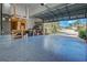 Spacious two car garage with epoxy flooring and room for storage and parking at 5007 Palermo Dr, Punta Gorda, FL 33950