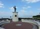 Statue on a pedestal with a circular brick base overlooking the water at 5007 Palermo Dr, Punta Gorda, FL 33950
