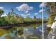 Beautiful canal view and lush landscaping at 5007 Palermo Dr, Punta Gorda, FL 33950