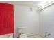 Bathroom under construction featuring red cement board and white fixtures at 5400 Gulf Dr # 25, Holmes Beach, FL 34217