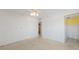 A clean and spacious bedroom leading into an attached bathroom at 5400 Gulf Dr # 25, Holmes Beach, FL 34217