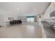 Bright clubhouse features tile flooring, and kitchenette area, perfect for gatherings and community events at 5400 Gulf Dr # 25, Holmes Beach, FL 34217