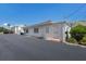 Charming single-story building with white exterior and well-maintained landscaping for a clean and inviting curb appeal at 5400 Gulf Dr # 25, Holmes Beach, FL 34217