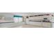 Clubhouse kitchenette has white cabinetry and lots of counter space at 5400 Gulf Dr # 25, Holmes Beach, FL 34217