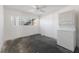 Bright laundry room with a window and stackable washer/dryer unit at 5400 Gulf Dr # 25, Holmes Beach, FL 34217