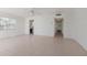 Spacious living room with tile flooring, ceiling fan, and natural light at 5400 Gulf Dr # 25, Holmes Beach, FL 34217