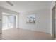 Empty living room with tile flooring and a ceiling fan at 5400 Gulf Dr # 25, Holmes Beach, FL 34217