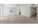 Spacious living room with tile flooring, ceiling fan, and bright natural light at 5400 Gulf Dr # 25, Holmes Beach, FL 34217