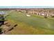 Aerial view of the property showing golf course views and community amenities at 5527 Palmer Cir # 105, Bradenton, FL 34211