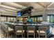Large bar area with comfortable seating, multiple screens and ample counter space for socializing at 5527 Palmer Cir # 105, Bradenton, FL 34211