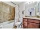 Full bathroom featuring tub, shower, and vanity with granite countertops at 5527 Palmer Cir # 105, Bradenton, FL 34211