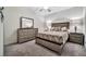 Bright bedroom with a decorative fish, side tables, and stylish furnishings at 5527 Palmer Cir # 105, Bradenton, FL 34211