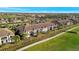 Scenic view of lovely condos near a golf course, providing a tranquil lifestyle at 5527 Palmer Cir # 105, Bradenton, FL 34211