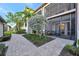 Exterior of the house and walkway with greenery around the house at 5527 Palmer Cir # 105, Bradenton, FL 34211