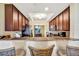 Kitchen featuring granite countertops, stainless steel appliances, and wooden cabinets at 5527 Palmer Cir # 105, Bradenton, FL 34211