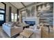 Upscale lounge with chic decor, featuring modern fireplace and comfortable seating at 5527 Palmer Cir # 105, Bradenton, FL 34211