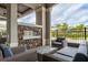 Relaxing outdoor lounge with comfortable seating and a stylish fireplace, creating a cozy atmosphere at 5527 Palmer Cir # 105, Bradenton, FL 34211