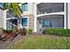 This charming patio features a screened-in porch, ideal for outdoor relaxation and entertaining at 5527 Palmer Cir # 105, Bradenton, FL 34211