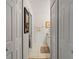 Hallway area showing access to a bathroom and closet space at 5743 Sabal Trace Dr # 101B57, North Port, FL 34287