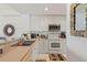 Well-maintained kitchen with white cabinetry and stainless steel appliances at 5743 Sabal Trace Dr # 101B57, North Port, FL 34287