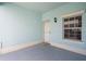 View of the tiled patio space outside the unit's front door with a window at 5743 Sabal Trace Dr # 101B57, North Port, FL 34287