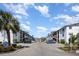 Well-maintained community featuring lush landscaping, ample parking, and attractive building exteriors at 5922 Garden Ln # A31, Bradenton, FL 34207