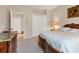 Cozy bedroom with a beautifully decorated bed, neutral walls, and classic furnishings at 6547 Oakland Hills Dr, Lakewood Ranch, FL 34202