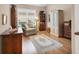 Inviting bedroom with a comfortable chair and ample storage at 6547 Oakland Hills Dr, Lakewood Ranch, FL 34202