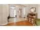 Welcoming foyer with neutral tile flooring, a decorative cabinet, and a bright entrance at 6547 Oakland Hills Dr, Lakewood Ranch, FL 34202