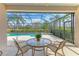 Relaxing screened lanai with seating and a view of the pool at 6547 Oakland Hills Dr, Lakewood Ranch, FL 34202
