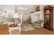 Bright living room with high ceilings, hardwood floors, and neutral color scheme at 6547 Oakland Hills Dr, Lakewood Ranch, FL 34202