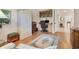 Well-lit home office with built-in shelving and wood floors at 6547 Oakland Hills Dr, Lakewood Ranch, FL 34202