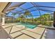 Screened pool and spa with ample deck space for entertaining outdoors at 6547 Oakland Hills Dr, Lakewood Ranch, FL 34202