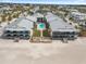 Luxurious condominiums offer beach access, a pool, and beautiful outdoor spaces at 6700 Gulf Dr # B8, Holmes Beach, FL 34217