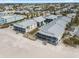Beach condos featuring a beautiful outdoor seating area, yard, and swimming pool at 6700 Gulf Dr # B8, Holmes Beach, FL 34217