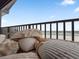 Balcony with decorative seashells and beach views at 6700 Gulf Dr # B8, Holmes Beach, FL 34217