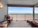 Inviting balcony with comfortable seating, perfect for enjoying the beach scenery at 6700 Gulf Dr # B8, Holmes Beach, FL 34217