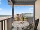 Balcony with seating and beachfront views at 6700 Gulf Dr # B8, Holmes Beach, FL 34217