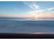Scenic beach view at sunset, showcasing the ocean and horizon at 6700 Gulf Dr # B8, Holmes Beach, FL 34217
